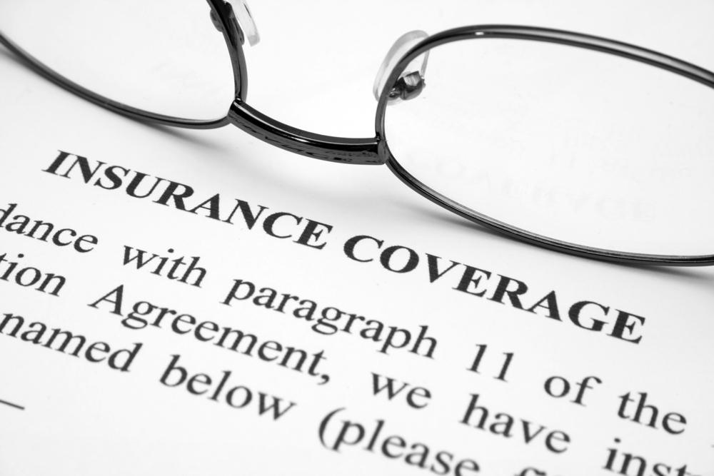 Insurance documents representing specialized coverage for personal and business risks in Fenton, MI